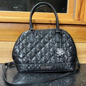 Medium sized black guess purse